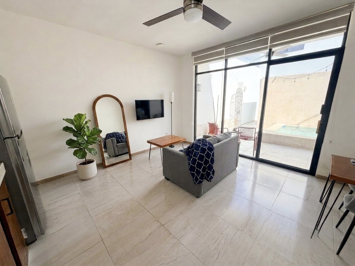 Living area opening onto the pool terrace